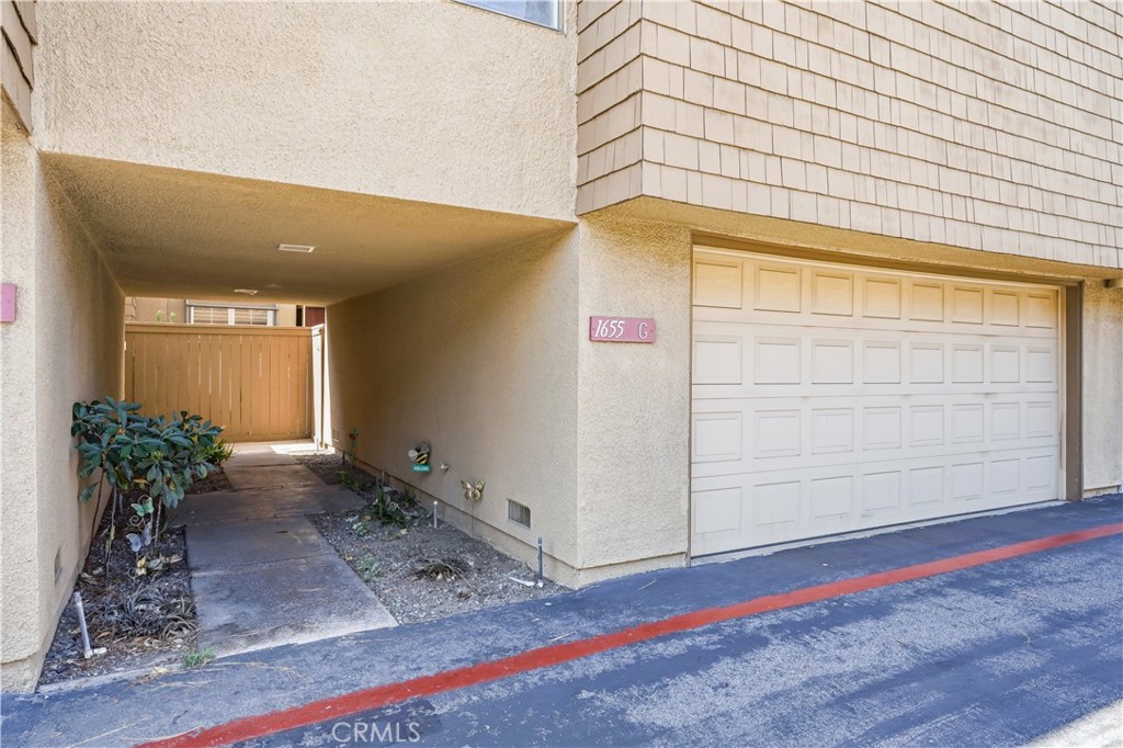 1655 West Lambert Road, Unit G La Habra, CA 90631 - Photo 20 of 21 Entry and garage.