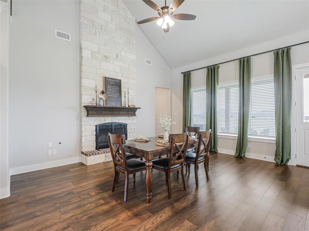 544 Majors Road Van Alstyne, TX 75495 - Photo 12 of 36 a view of a dining room with furniture and wooden floor
