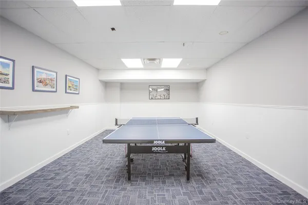 a table with chairs and a table in it