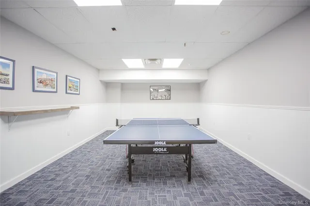 a table with chairs and a table in it