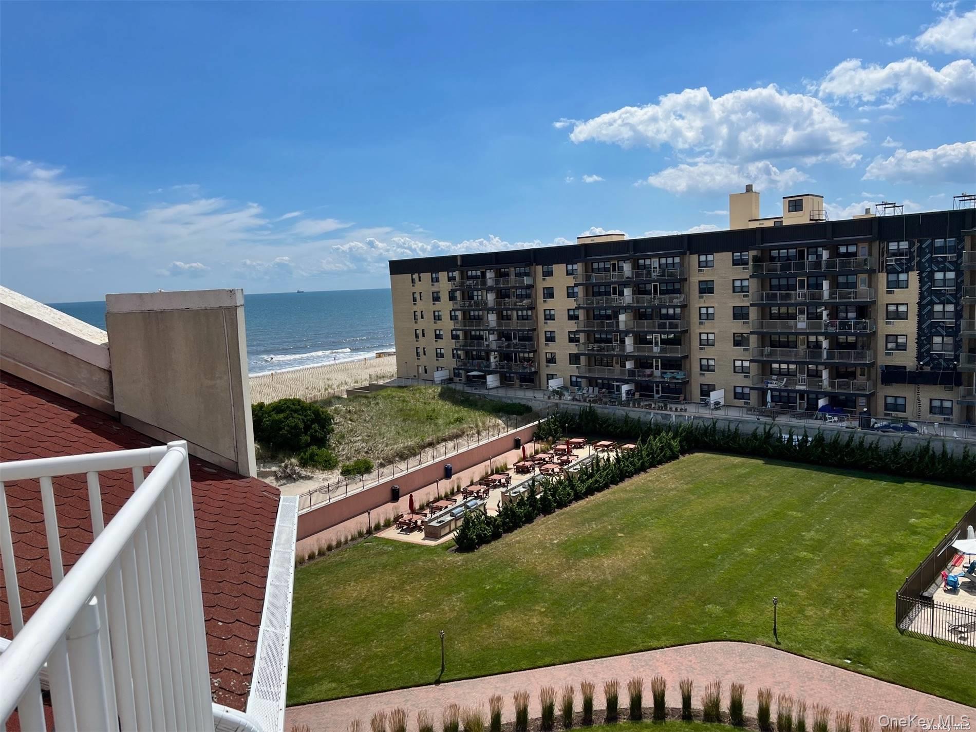 2 Richmond Road, Unit PH 6R Lido Beach, NY 11561 - Photo 6 of 19 a view of building with garden