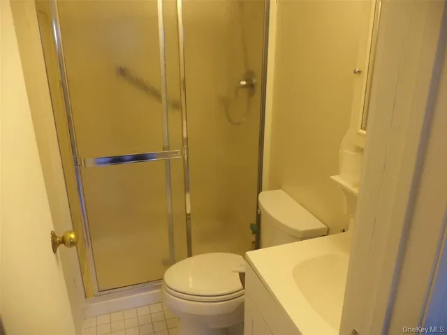 a side view of a house with a yard