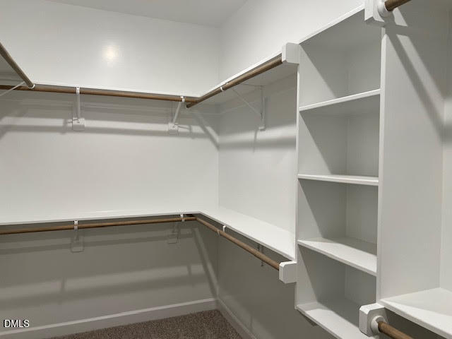 147 Seahawk Way Zebulon, NC 27597 - Photo 13 of 23 a view of an empty walk in closet