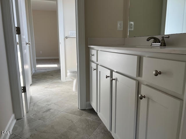 147 Seahawk Way Zebulon, NC 27597 - Photo 16 of 23 a view of a bathroom from a hallway