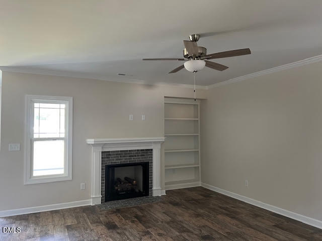 147 Seahawk Way Zebulon, NC 27597 - Photo 5 of 23 an empty room with windows and a fireplace