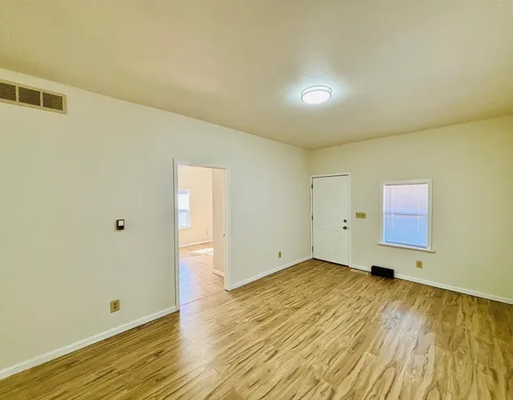 a kitchen with a refrigerator stove and a sink