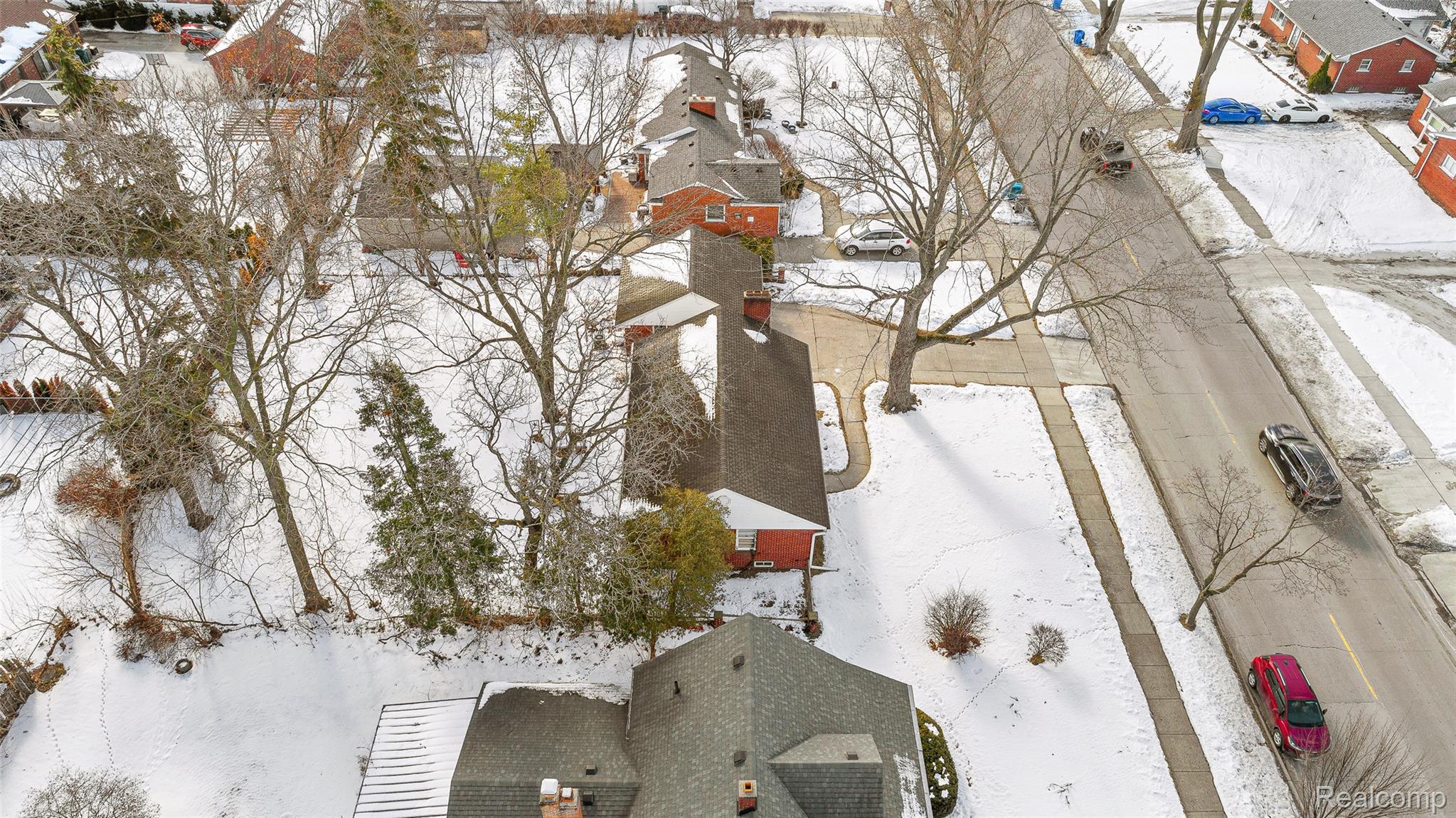 1830 North Gulley Road Dearborn, MI 48128 - Photo 6 of 29 Snowy aerial view featuring a residential view