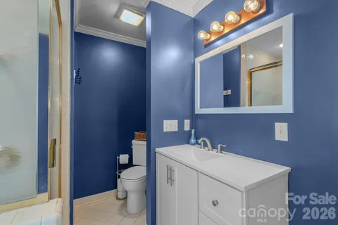 a bathroom with a tub and a shower