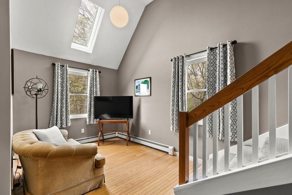 732 Hickory Road North Attleboro, MA 02760 - Photo 13 of 41 a living room with furniture wooden floor and a large window