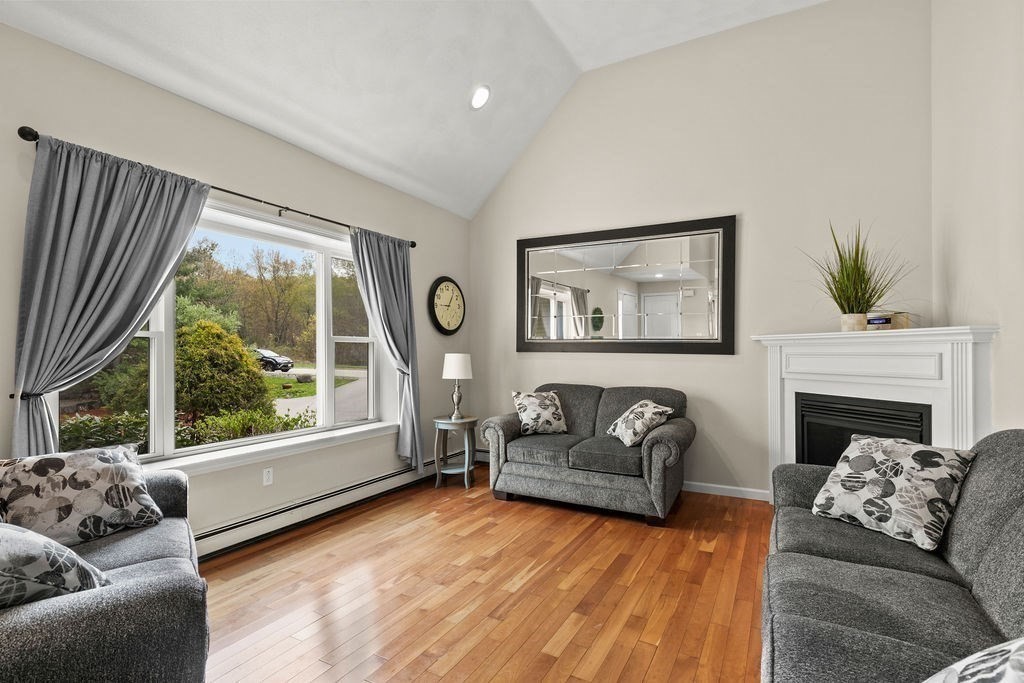 732 Hickory Road North Attleboro, MA 02760 - Photo 2 of 41 a living room with furniture and a large window
