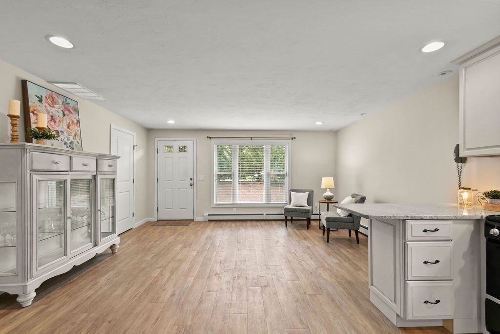 732 Hickory Road North Attleboro, MA 02760 - Photo 23 of 41 a view of a livingroom with furniture wooden floor and a window