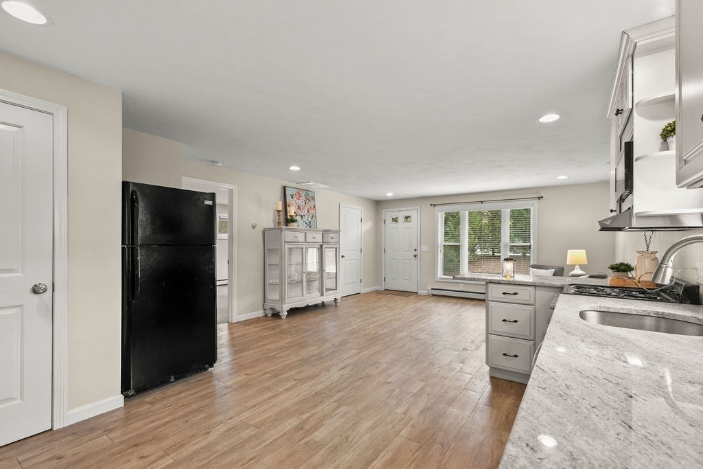 732 Hickory Road North Attleboro, MA 02760 - Photo 24 of 41 a view of a kitchen with a sink and a refrigerator