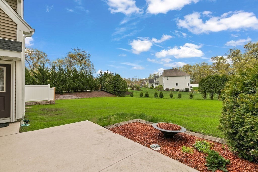 732 Hickory Road North Attleboro, MA 02760 - Photo 27 of 41 a view of a backyard with plants and a garden