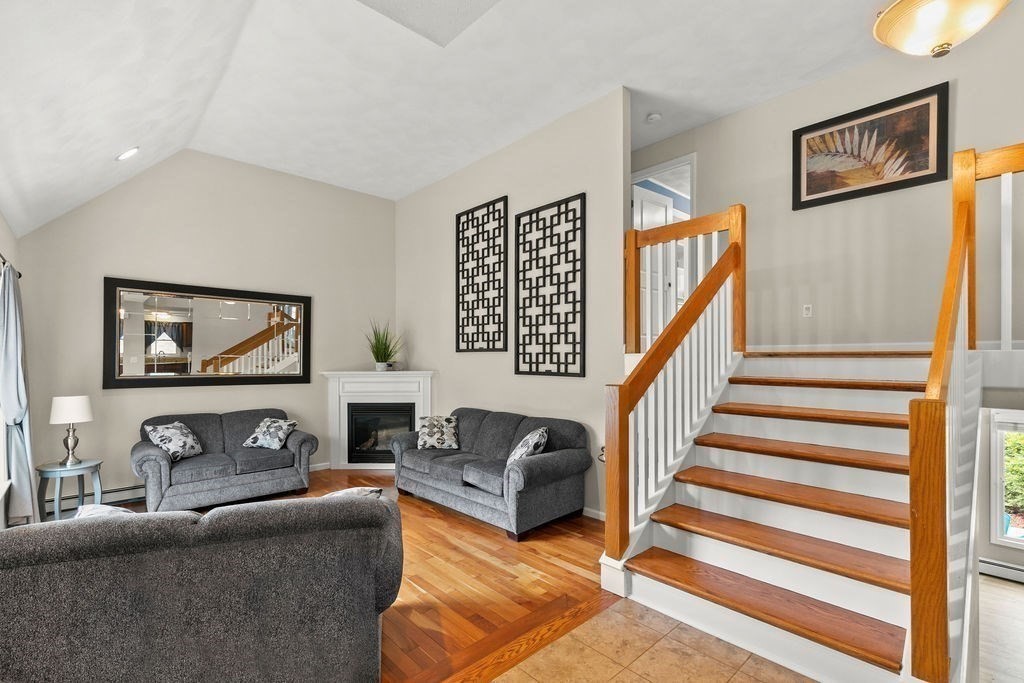 732 Hickory Road North Attleboro, MA 02760 - Photo 3 of 41 a living room with furniture and a fireplace