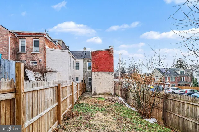 a cars parked in front of a building