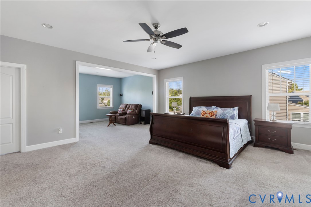 12008 Stable Ridge Terrace Glen Allen, VA 23059 - Photo 18 of 38 a bedroom with a bed and window