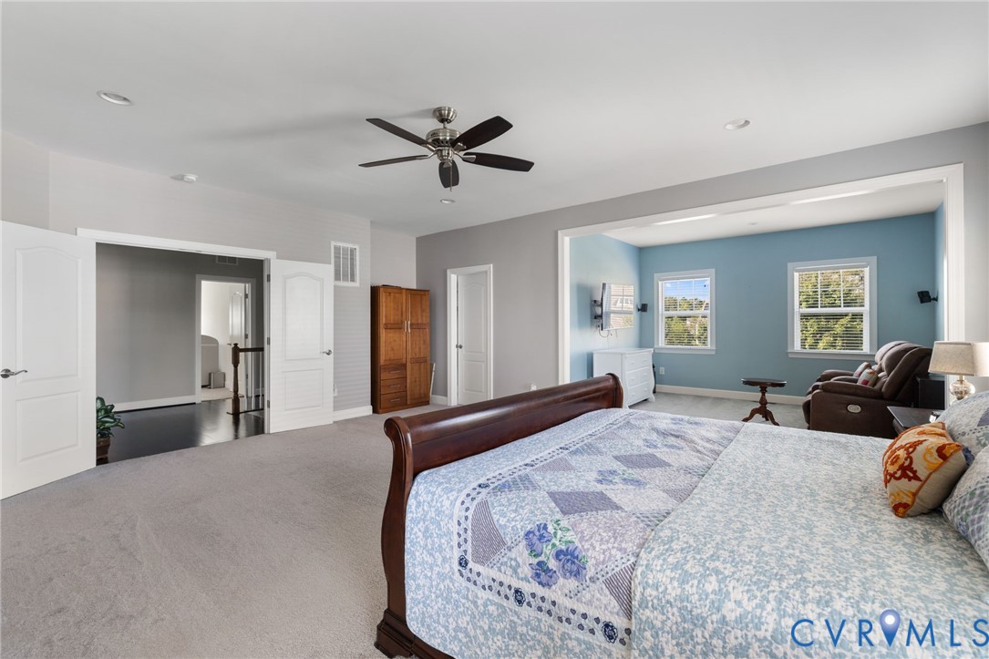 12008 Stable Ridge Terrace Glen Allen, VA 23059 - Photo 19 of 38 a bedroom with a bed and window