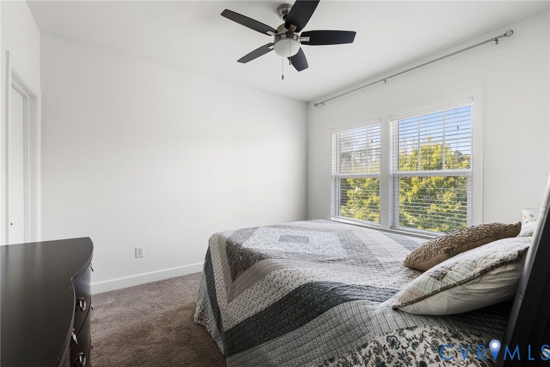 12008 Stable Ridge Terrace Glen Allen, VA 23059 - Photo 26 of 38 a bedroom with a bed and a window