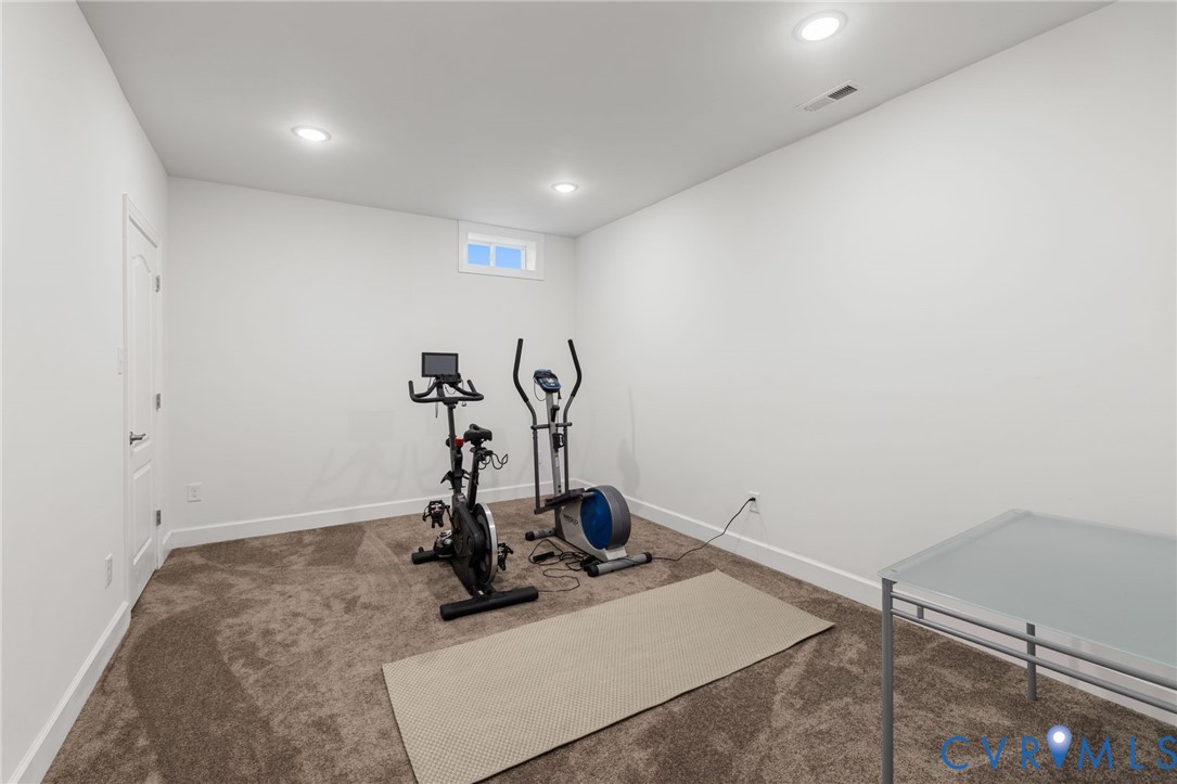 12008 Stable Ridge Terrace Glen Allen, VA 23059 - Photo 31 of 38 a room with gym equipment