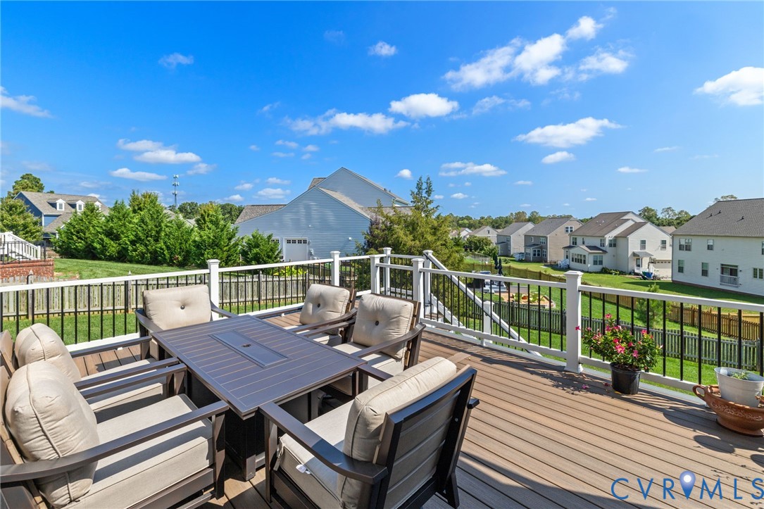12008 Stable Ridge Terrace Glen Allen, VA 23059 - Photo 33 of 38 a view of a deck with wooden floor and outdoor seating
