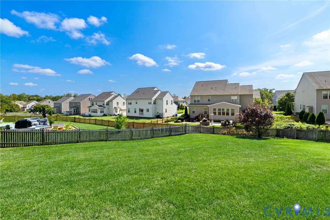12008 Stable Ridge Terrace Glen Allen, VA 23059 - Photo 35 of 38 a view of a garden with houses