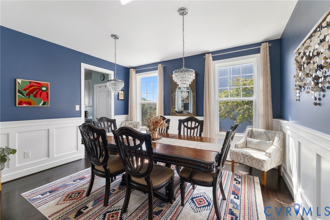 12008 Stable Ridge Terrace Glen Allen, VA 23059 - Photo 6 of 38 a view of a dining room with furniture window and wooden floor