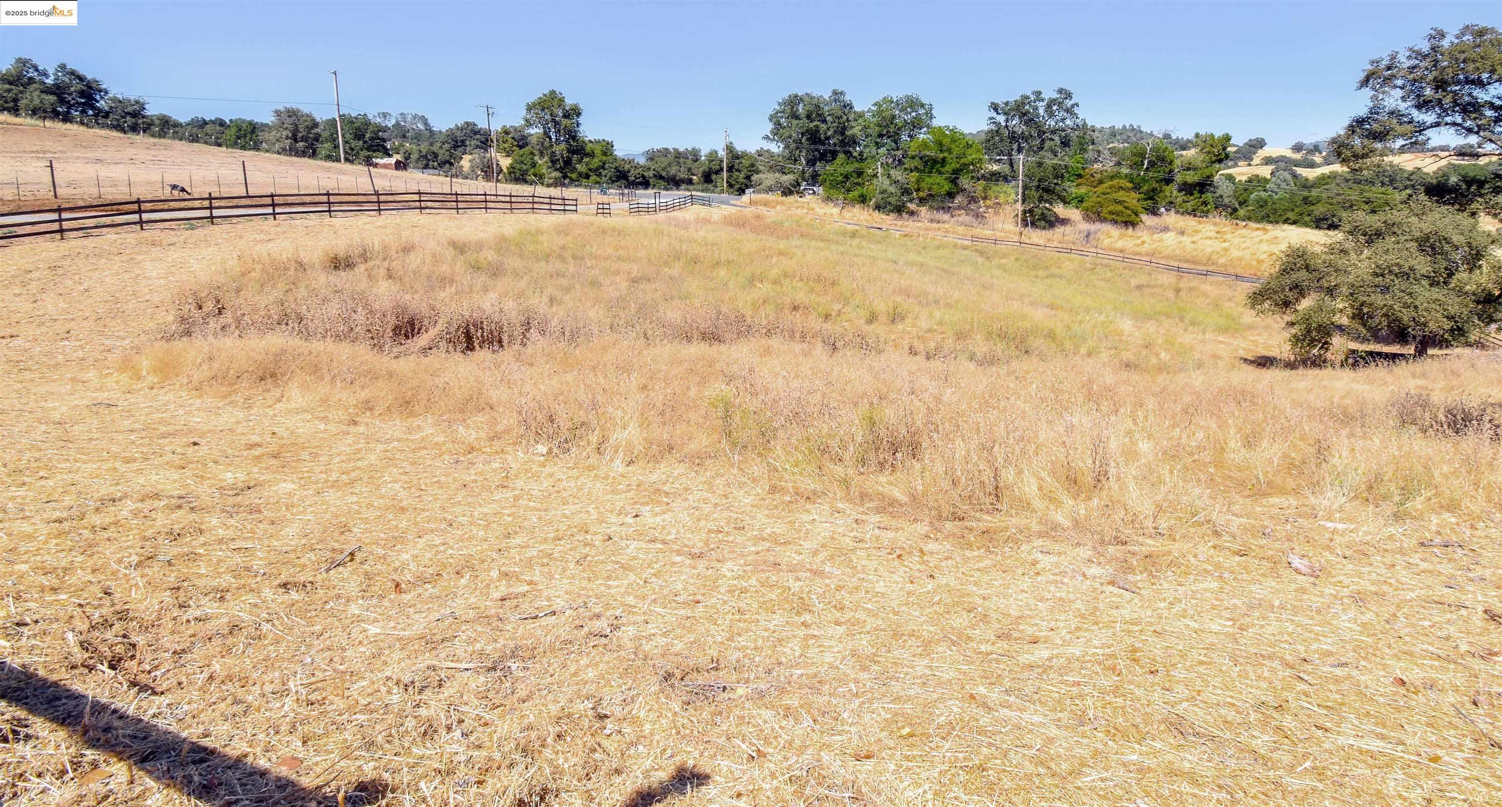 17390 Campbells Flat Road Sonora, CA 95370 - Photo 34 of 37 a view of a yard with an outdoor space