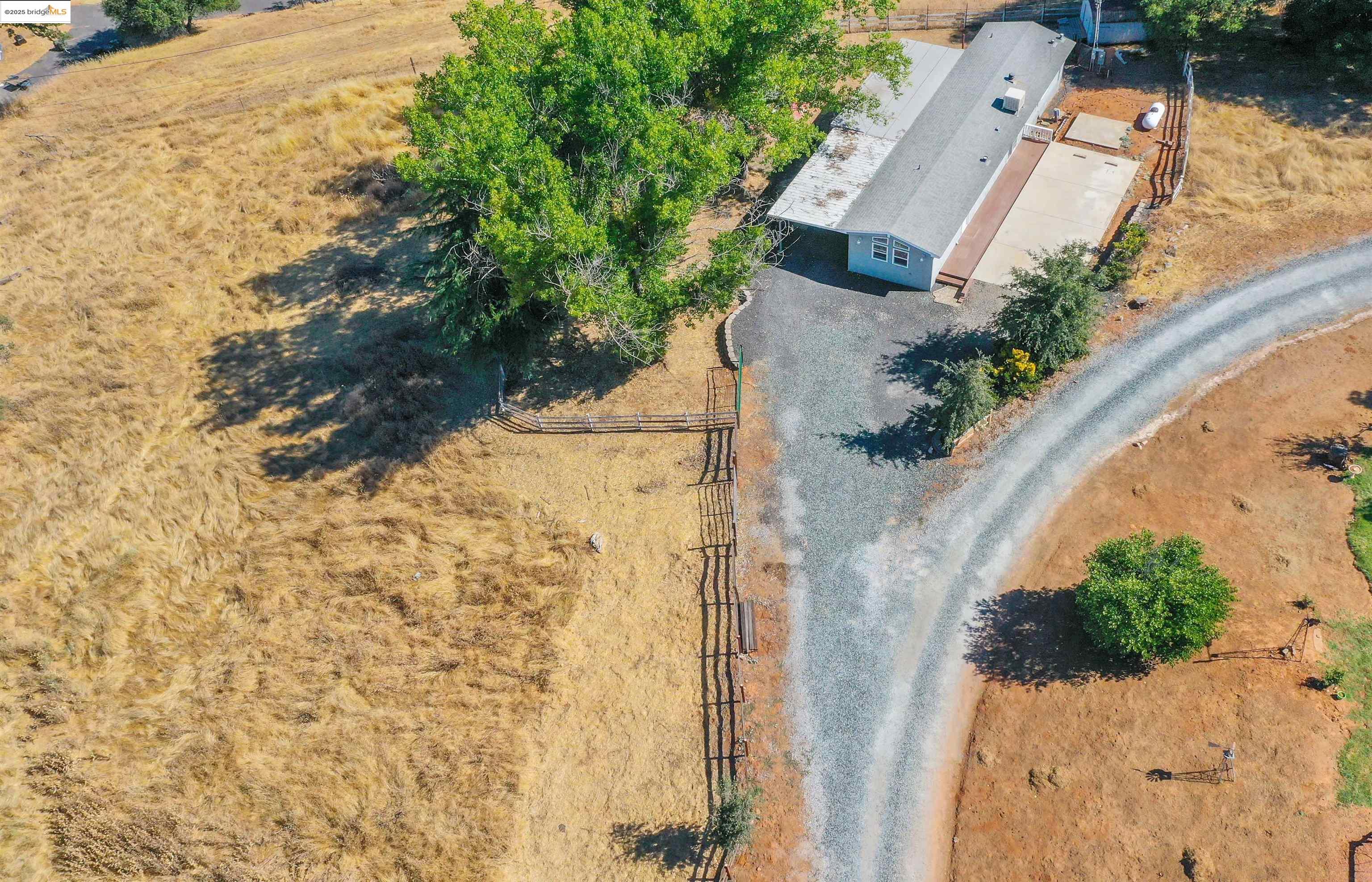 17390 Campbells Flat Road Sonora, CA 95370 - Photo 35 of 37 an aerial view of residential houses with outdoor space
