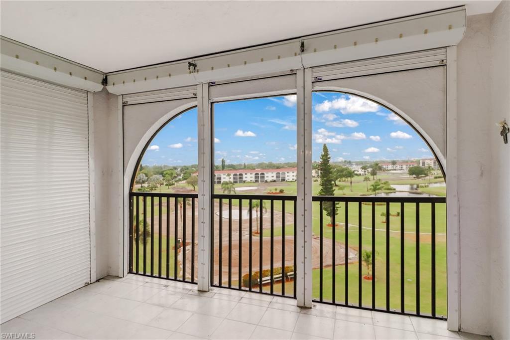 21 High Point Circle East, Unit 601 Naples, FL 34103 - Photo 22 of 23 Wonderful views of the entire golf course, hurricane shutters.