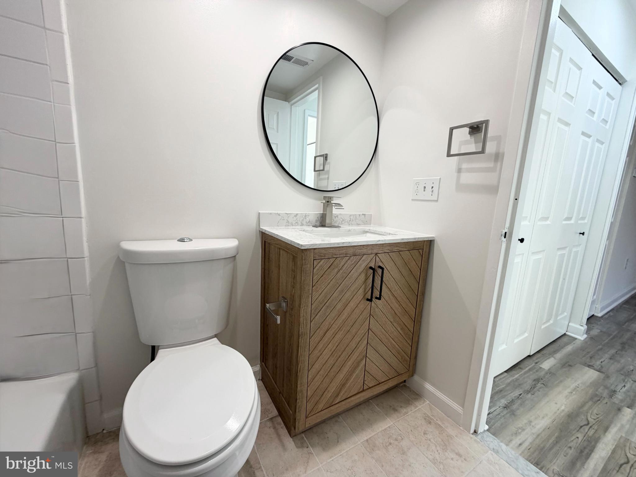 10024 Stedwick Road, Unit 301 Gaithersburg, MD 20886 - Photo 11 of 17 Modern bathroom with stylish finishes.