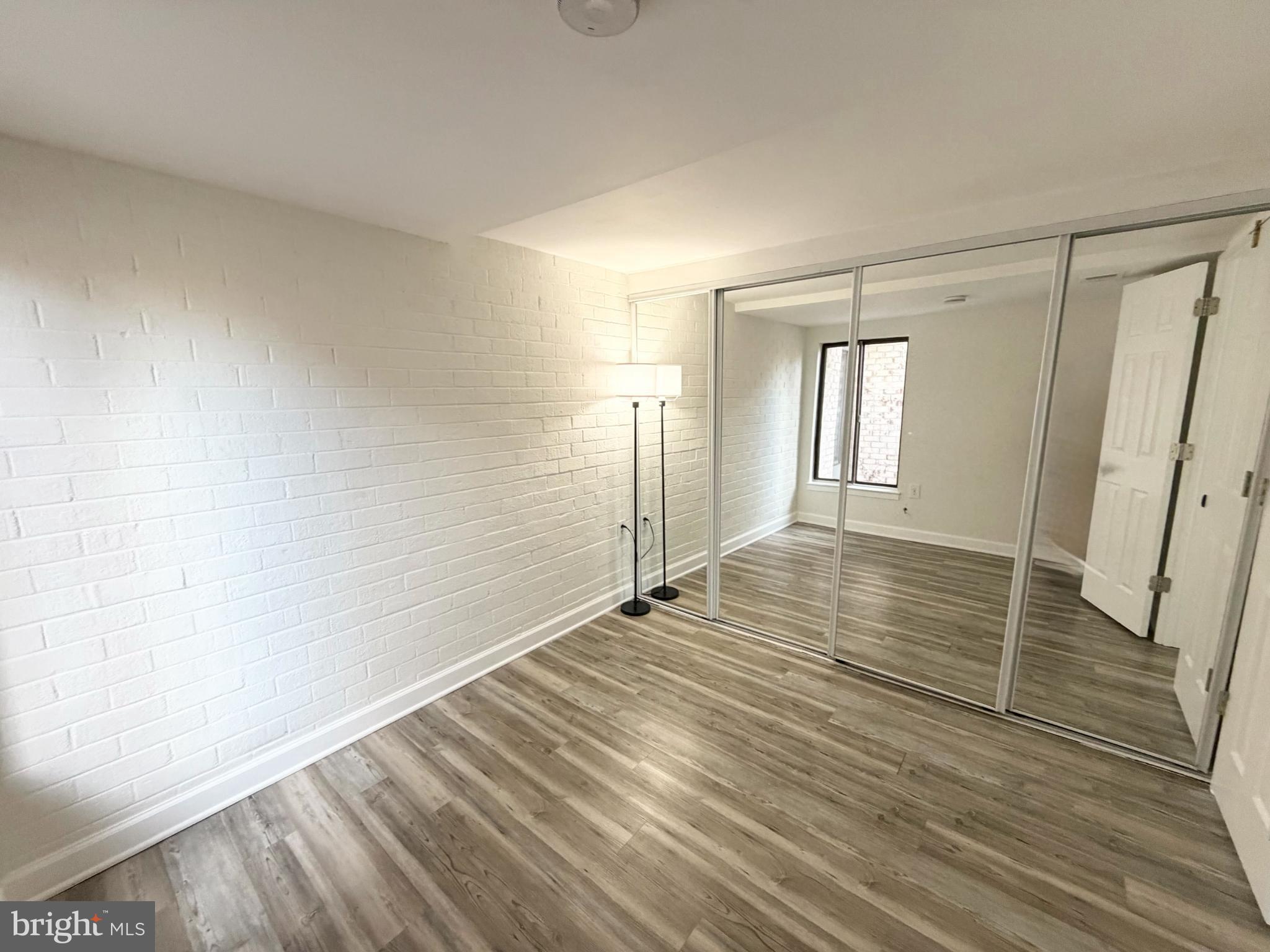 10024 Stedwick Road, Unit 301 Gaithersburg, MD 20886 - Photo 15 of 17 Bright, airy space with mirrored accents.