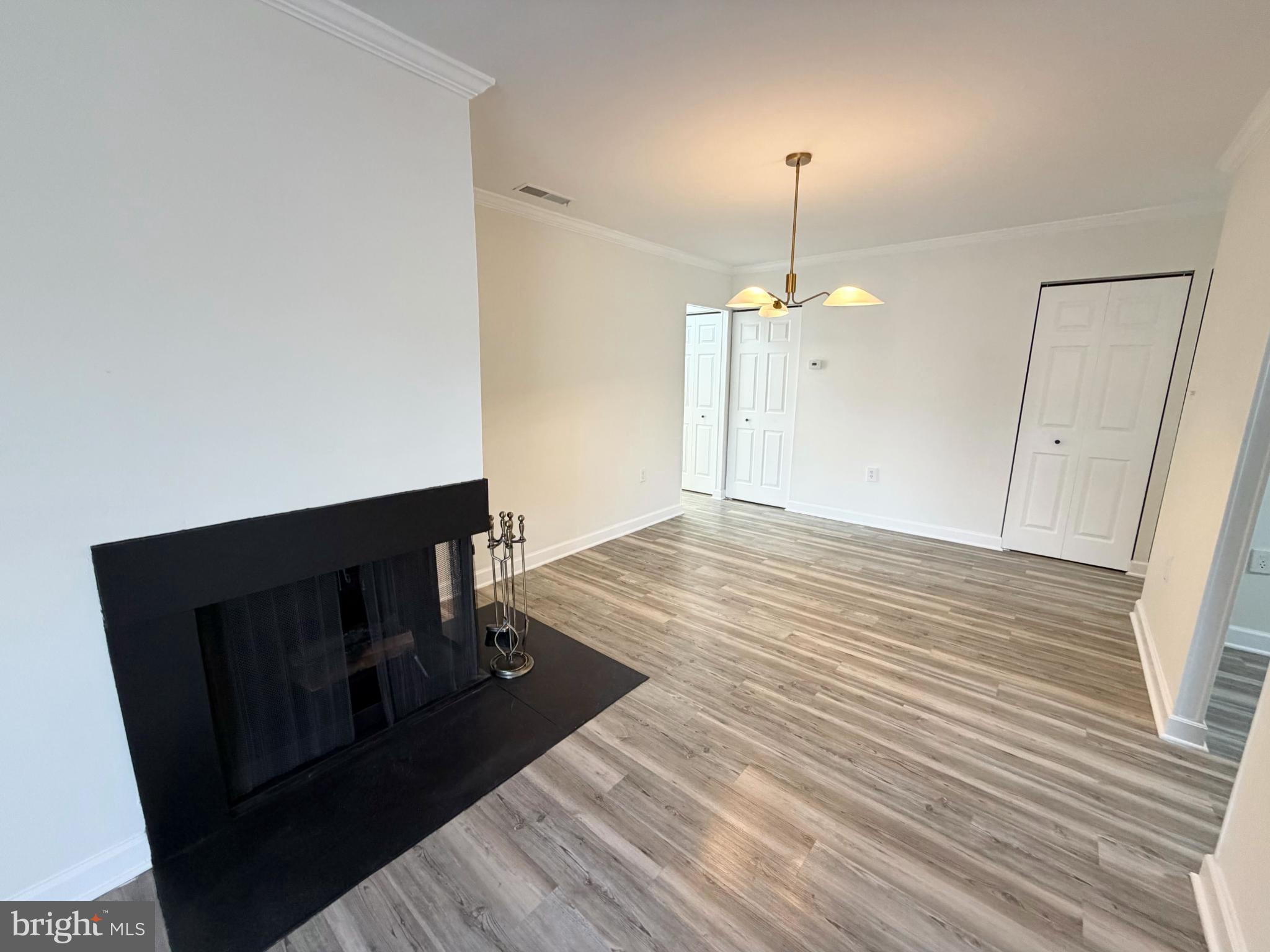10024 Stedwick Road, Unit 301 Gaithersburg, MD 20886 - Photo 6 of 17 Bright and airy living space with modern charm.
