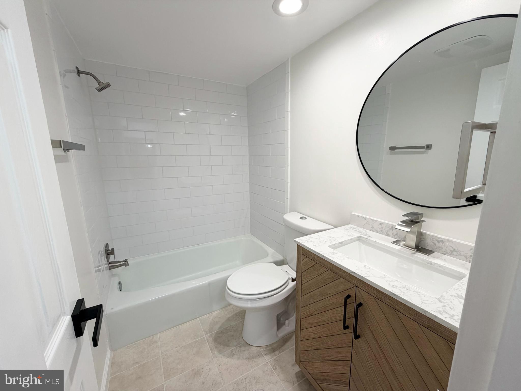 10024 Stedwick Road, Unit 301 Gaithersburg, MD 20886 - Photo 10 of 17 Modern bathroom with sleek finishes.