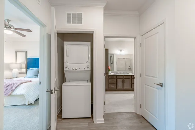 a en suite bathroom with a sink and a mirror