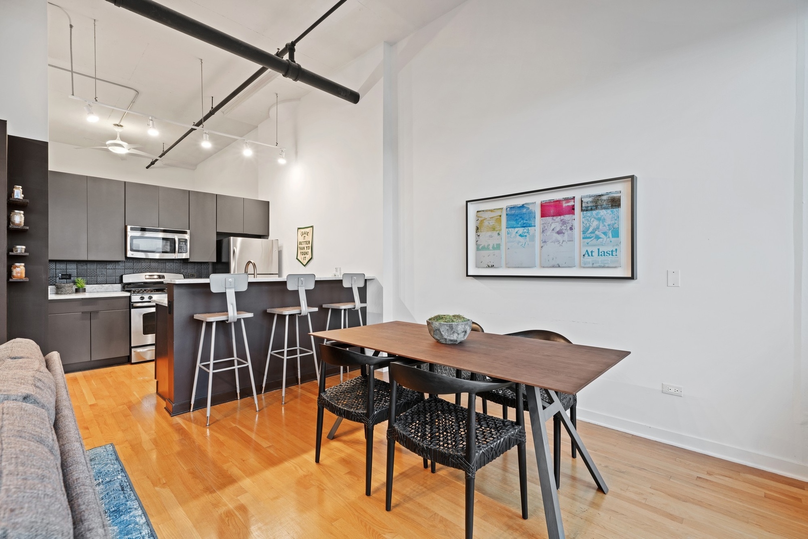 1224 West Van Buren Street, Unit 304 Chicago, IL 60607 - Photo 14 of 28 a view of a dining room with furniture