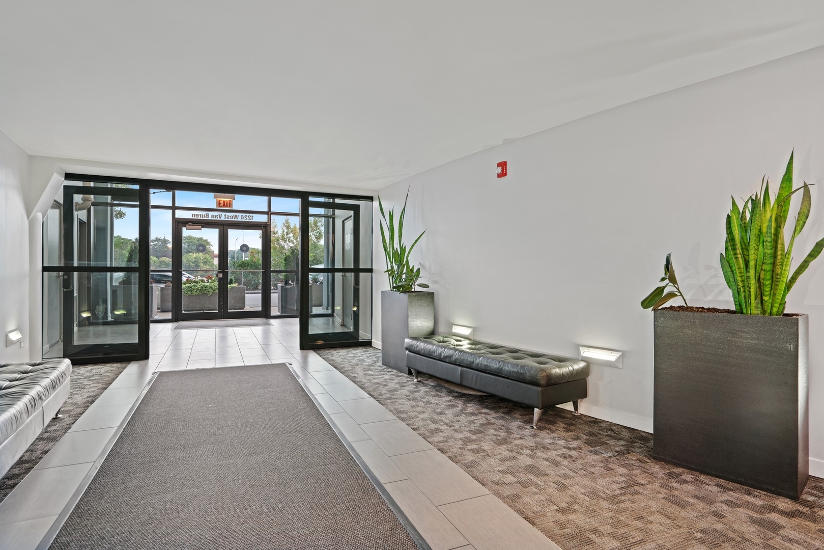 1224 West Van Buren Street, Unit 304 Chicago, IL 60607 - Photo 3 of 28 a living room with furniture and a large window