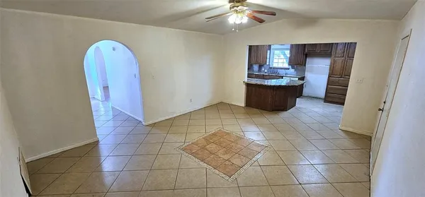 a view of a kitchen with a sink cabinets and a window