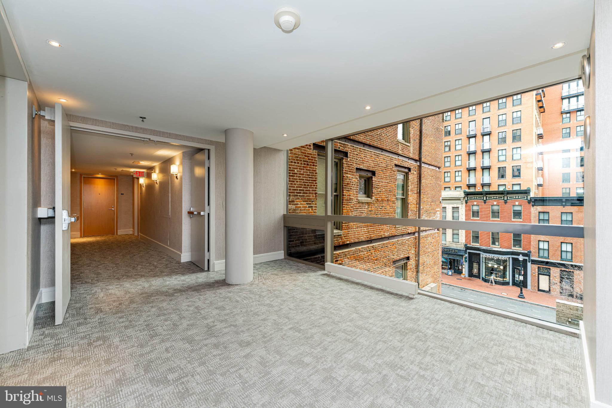 675 E Street Northwest, Unit 350 Washington, DC 20004 - Photo 17 of 20 Modern urban corridor with city views.