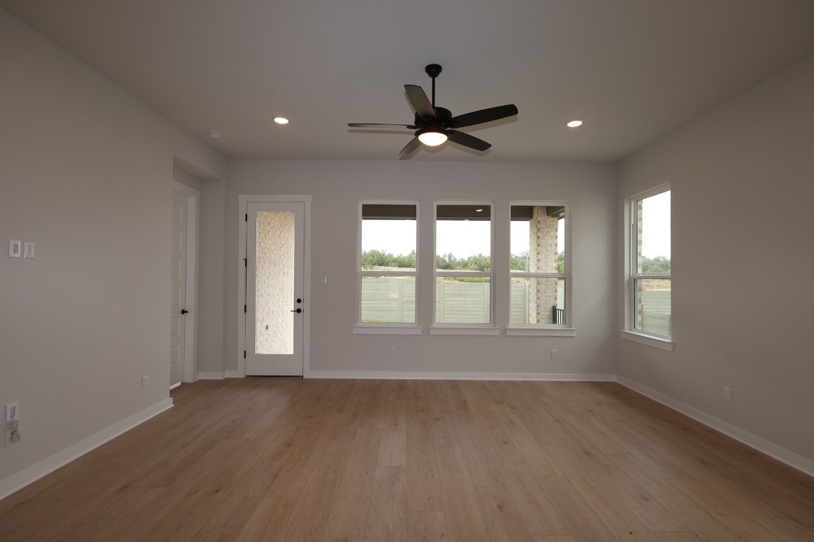 421 Leaning Rock Road Georgetown, TX 78628 - Photo 5 of 14 a view of an empty room with a window