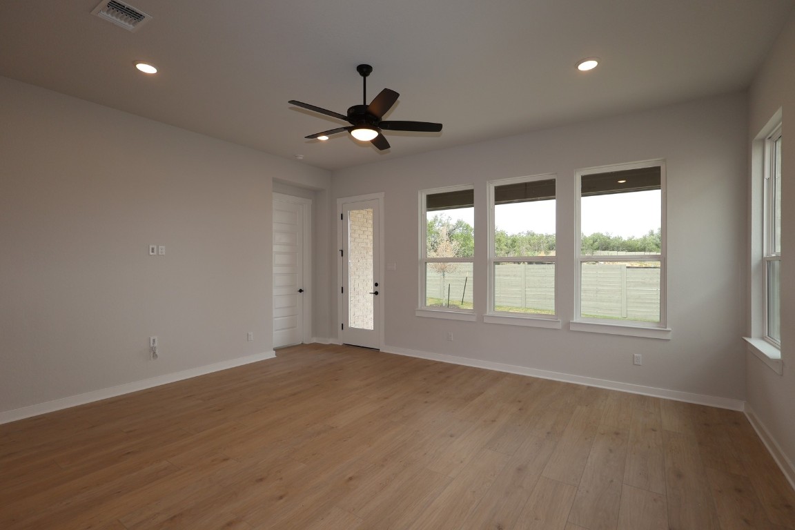 421 Leaning Rock Road Georgetown, TX 78628 - Photo 6 of 14 a view of an empty room with a window