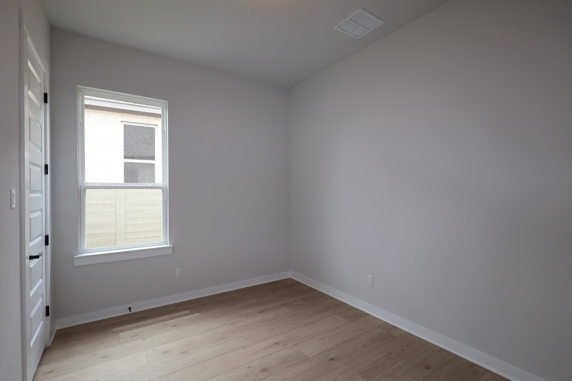 421 Leaning Rock Road Georgetown, TX 78628 - Photo 10 of 14 an empty room with a window