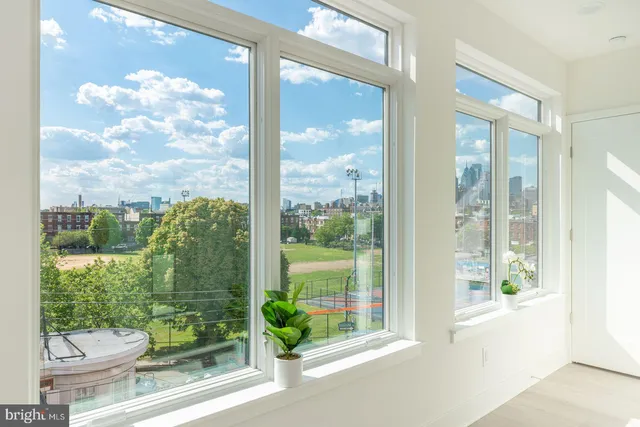 a view of a glass door and porch