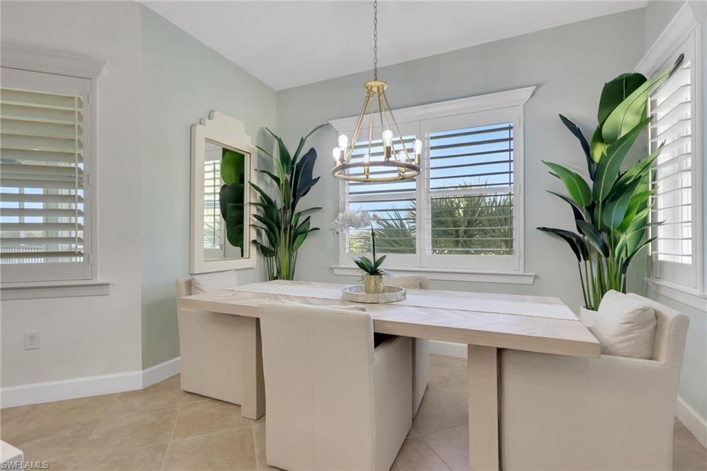 7877 Clemson Street, Unit 202 Naples, FL 34104 - Photo 12 of 36 a view of kitchen with sink and window