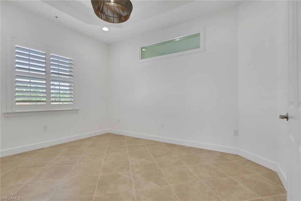 7877 Clemson Street, Unit 202 Naples, FL 34104 - Photo 22 of 36 wooden floor in a room