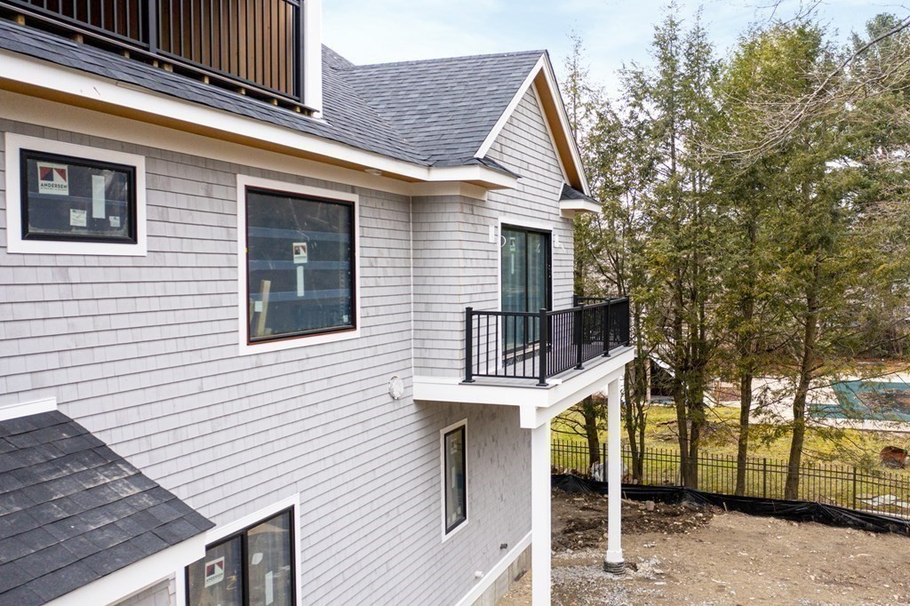 240 Old Farm Road Newton, MA 02459 - Photo 5 of 24 a view of a house with a balcony
