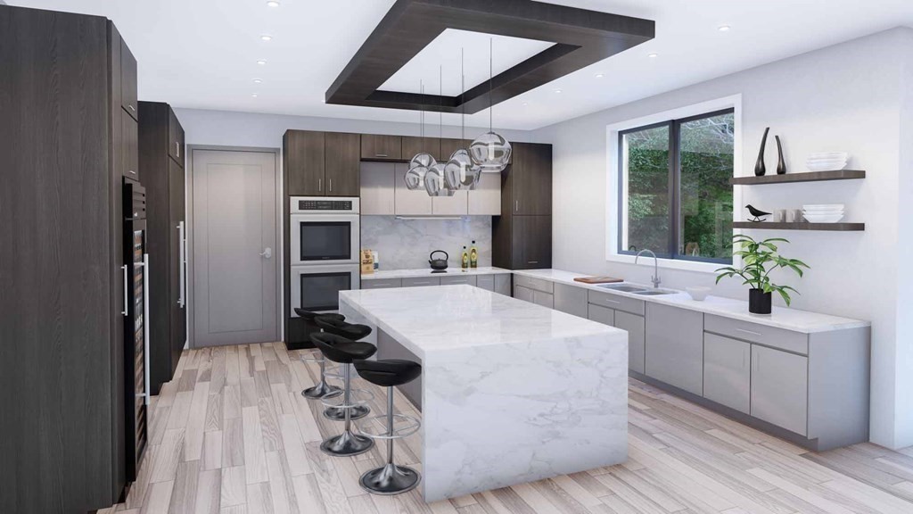 240 Old Farm Road Newton, MA 02459 - Photo 7 of 24 a room with kitchen island a counter top space a sink and cabinets
