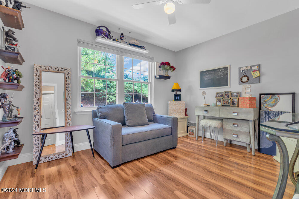 2 Bramble Lane Matawan, NJ 07747 - Photo 21 of 28 a living room with furniture and a large window