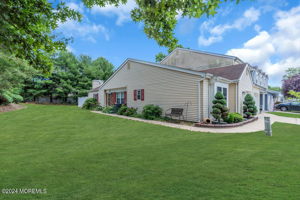 2 Bramble Lane Matawan, NJ 07747 - Photo 3 of 28 a front view of house with yard and green space