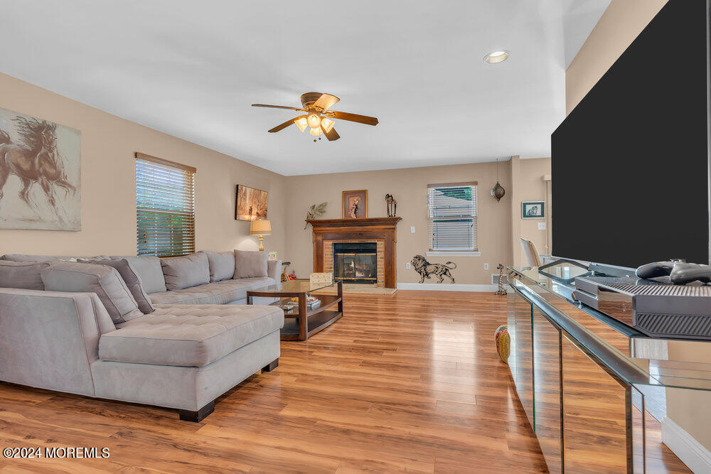 2 Bramble Lane Matawan, NJ 07747 - Photo 7 of 28 a living room with furniture and a fireplace