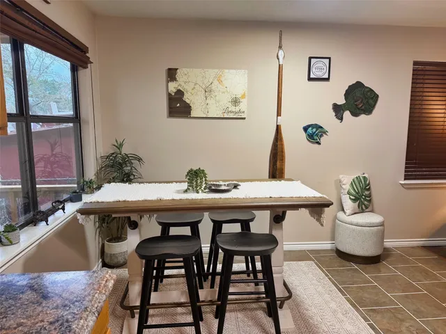 a table and chairs in a room